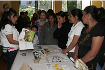 a crowd at a workshop demonstration